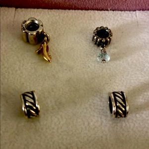 Two Pandora charms and two separators